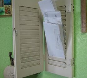 s 12 genius decor hacks we just didn t see coming, Store your mail in old shutters