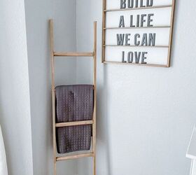 s 15 gorgeous diys for 30 and under that ll beautify your home, A wooden farmhouse style blanket ladder