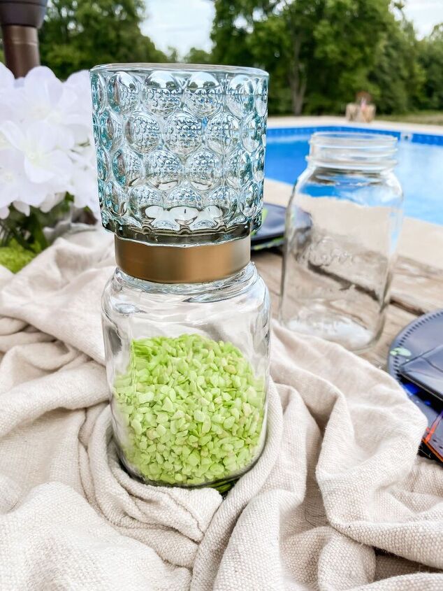 mesa de vero ao lado da piscina paisagem e castial de vela de ch de rvore de dlar