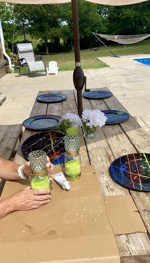 mesa de vero ao lado da piscina paisagem e castial de vela de ch de rvore de dlar