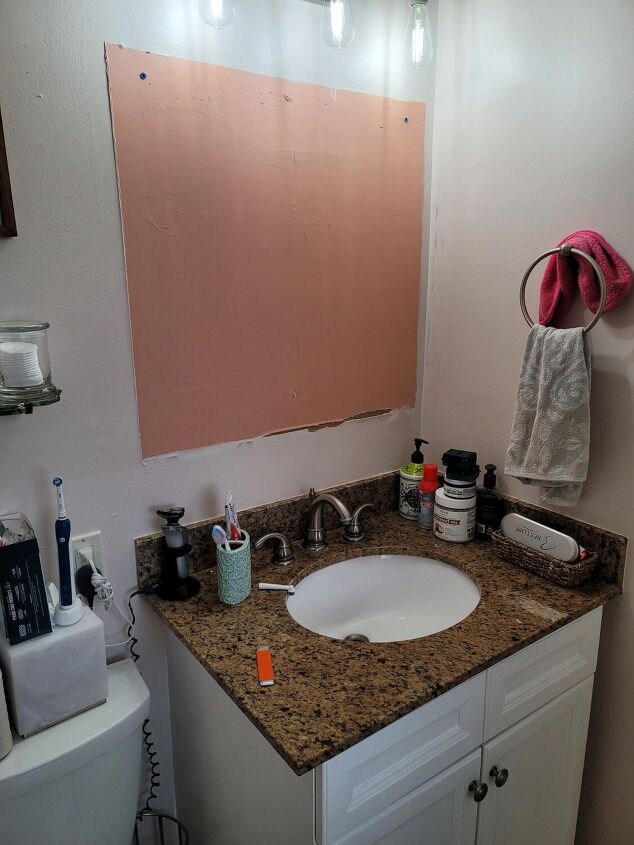 budget friendly bathroom upgrade and recessed cabinet install