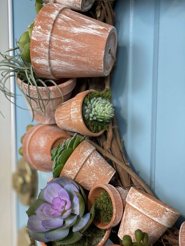s 18 amazing terracotta pot ideas most people have never thought of, Clay Pot Wreath