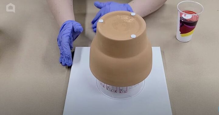 s 18 amazing terracotta pot ideas most people have never thought of, Flower Pot Paint Pour