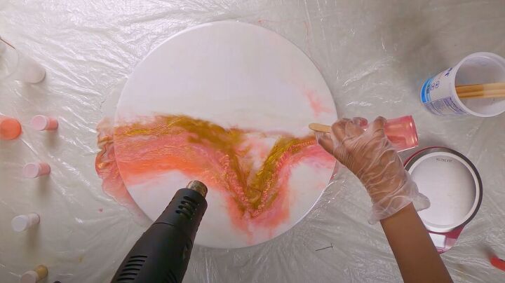 layered epoxy resin pour art in white pink and gold