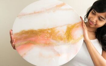Arte de resina epoxi en capas en blanco, rosa y oro