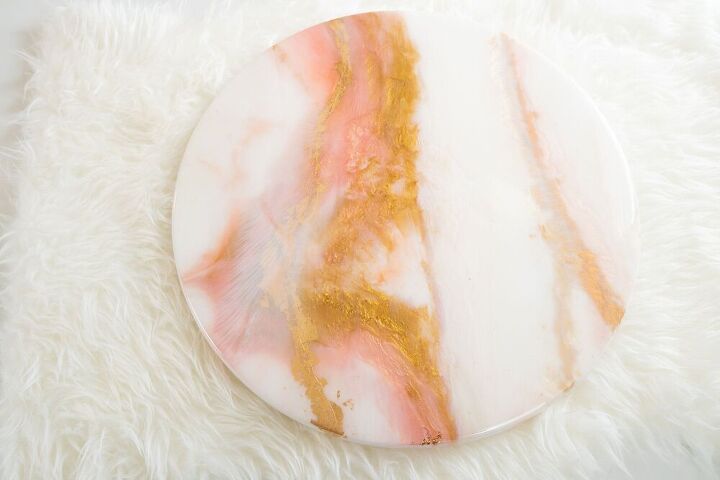 layered epoxy resin pour art in white pink and gold