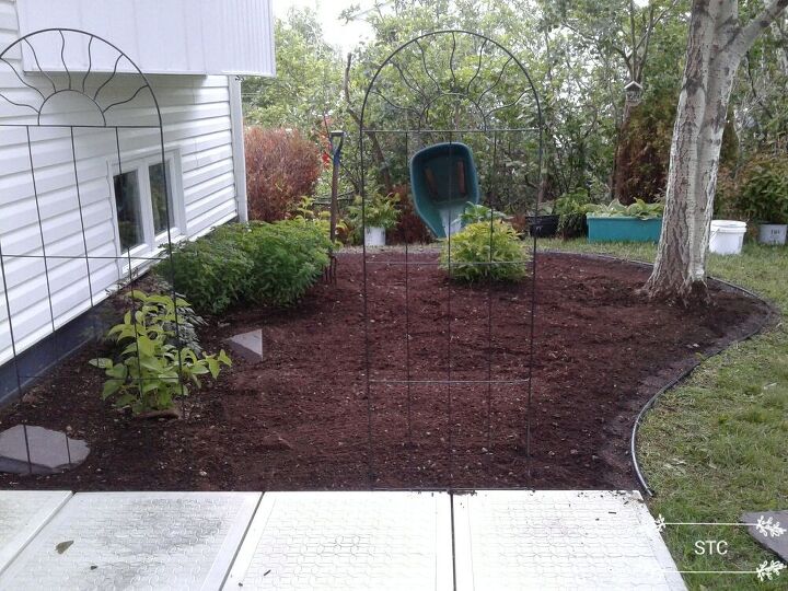 how we updated our walkway and shrub bed, Compacting Soil around Outline