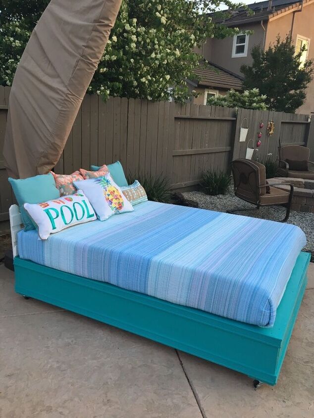 s 16 ideas that ll help you soak in the last weeks of summer, An outdoor pool lounge bed