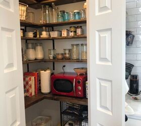s 18 easy shelving storage solutions that will change your life, Install industrial style shelving in your pantry