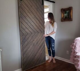 s 13 gorgeous reasons why we re so not over the barn door trend, Her modern farmhouse bedroom door