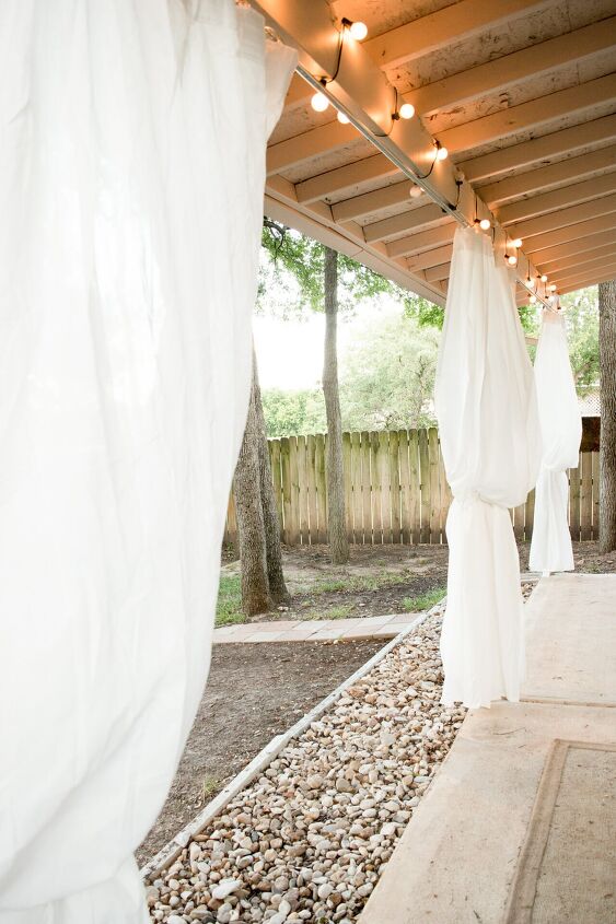 s 10 ways to turn a corner of your yard into a mini paradise, Hang pretty flowy curtains