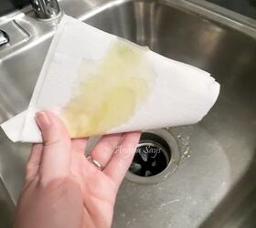 how to clean a stainless steel sink so it sparkles, paper towel covered in oil