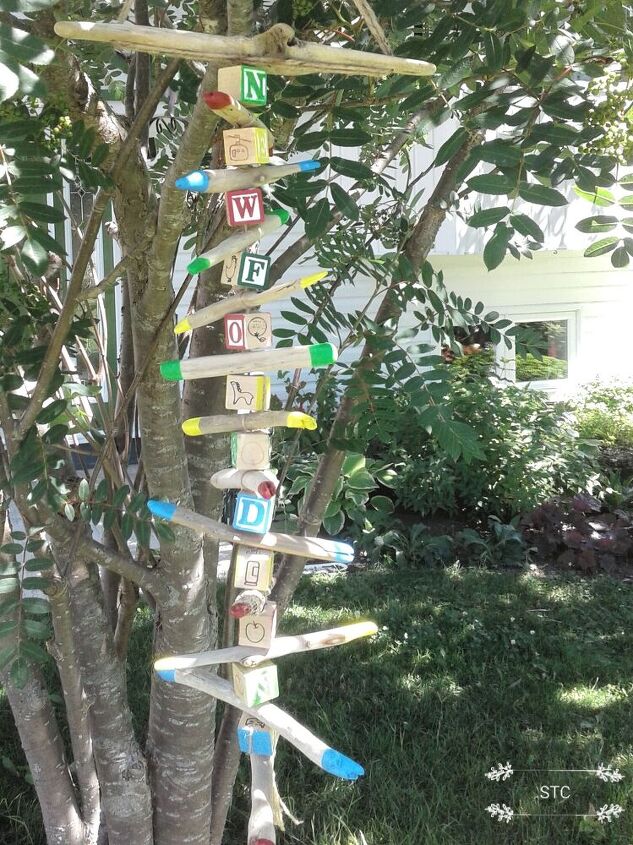 how i turned alphabet blocks and driftwood into garden decor, Hanging in My Tree