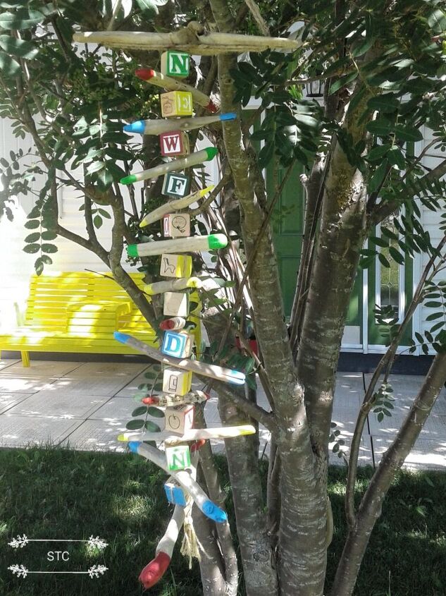 how i turned alphabet blocks and driftwood into garden decor, Pretty Pops of Color