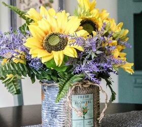 s 16 of the smartest ways to reuse empty tin cans, This cheerful sunflower arrangement