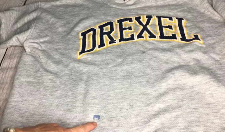 don t panic here s how to get paint out of clothes, Gray shirt with paint stain