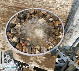 Fill a flower pot with rocks and water to get this pretty porch accent in just 15 minutes flat