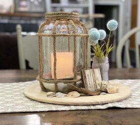 s grab a leftover pickle jar for this expensive looking lantern idea, Glue decorative rope to your glass jar to create a lovely nautical lantern to light up your dining table
