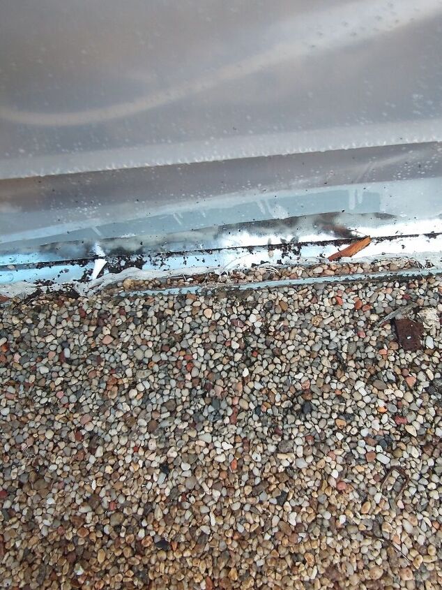 q how do i fix water getting into my walkout basement from my patio