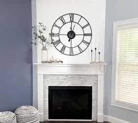 s 15 ways to update the fireplace you can t stand to look at anymore, Surround it with beautiful stone