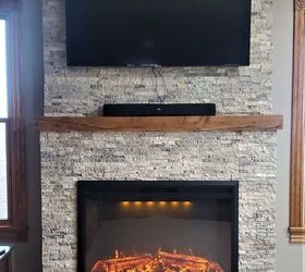 s 15 ways to update the fireplace you can t stand to look at anymore, Build a stunning stone fireplace