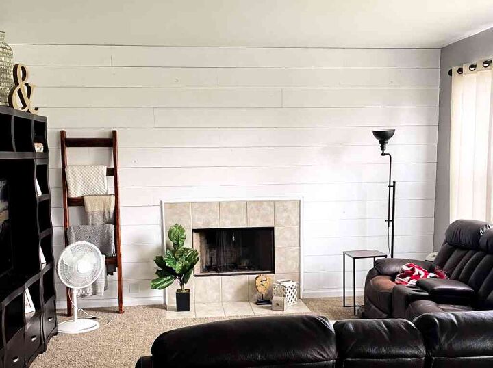 s 15 ways to update the fireplace you can t stand to look at anymore, Install a rustic shiplap accent wall