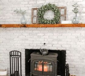 s 15 ways to update the fireplace you can t stand to look at anymore, Whitewash your brick fireplace