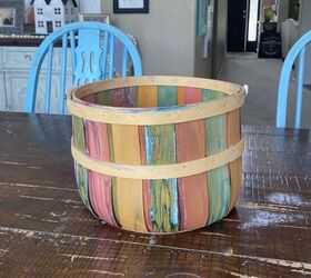 This is seriously the cutest way to use an old basket on your porch