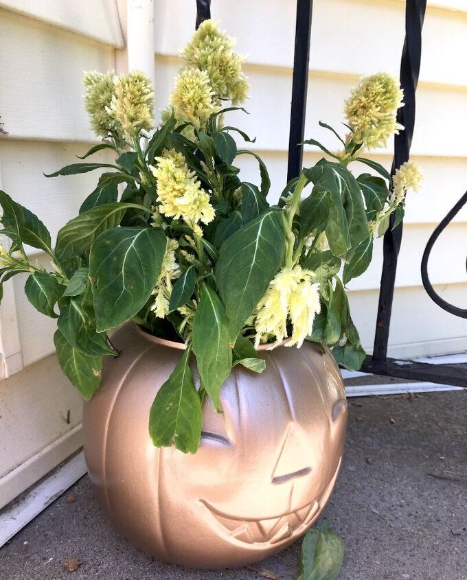s 14 outdoor decor ideas everyone needs to see before fall, A copper pumpkin planter