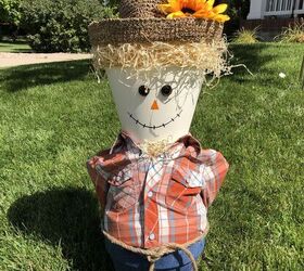 s 14 outdoor decor ideas everyone needs to see before fall, A fashionable flower pot scarecrow