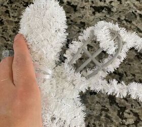 She takes apart a dollar store bunny decoration for this rustic spring decor idea