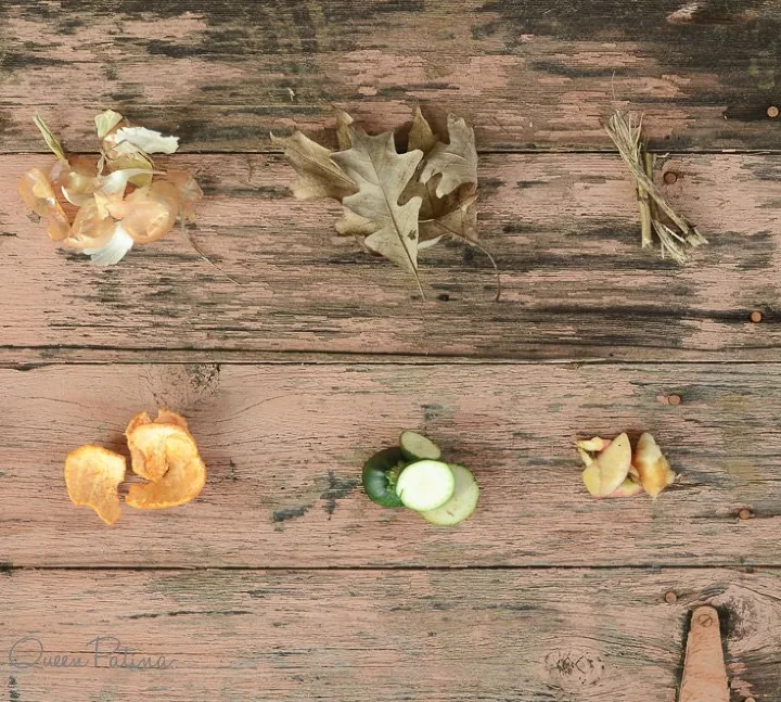 don t toss out your food quite yethere s how to make compost, Food and yard scraps on wood table