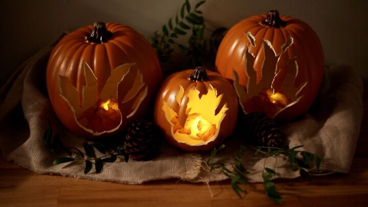 s 15 gorgeous ways to switch up your decor this fall, These fiery carved pumpkins