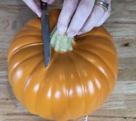 Grab 2 plastic pumpkins for a front yard look absolutely no one is expecting