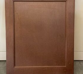 You're going to be searching every curbside for a spare cabinet door when you see this gorgeous decor idea