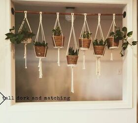 s 18 better ways to show off your houseplants, An industrial copper macrame plant hanger