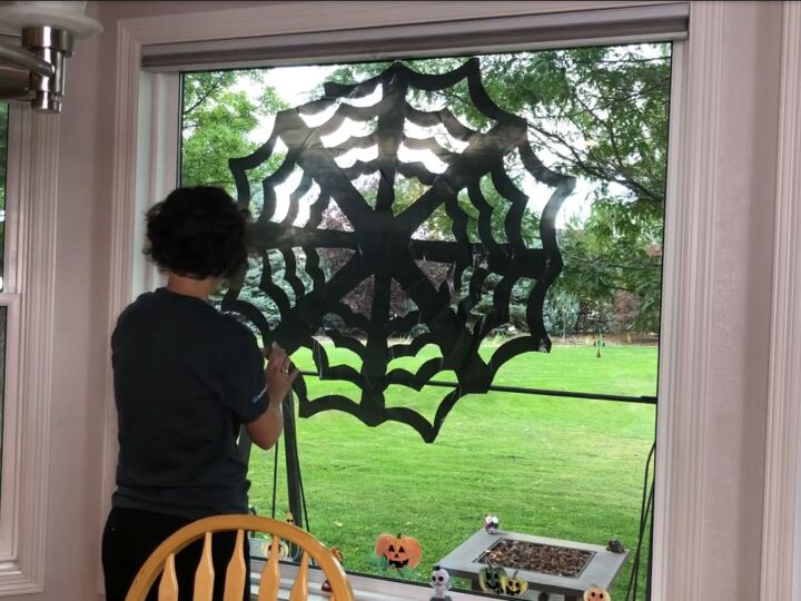s creep your neighbors out with these 8 halloween yard ideas, A giant trash bag cobweb