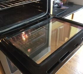 how to clean an oven inside and out, clean oven with open door