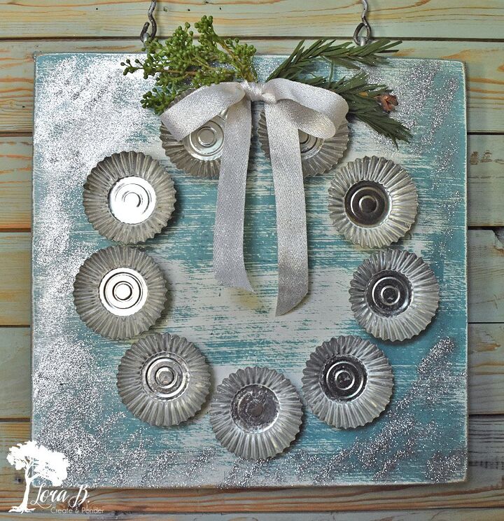 s 14 fun uses for old unwanted baking pans, Her charming tin wall art