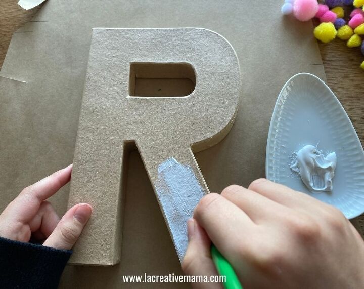 get kids crafting with easy pom pom paper mache letters