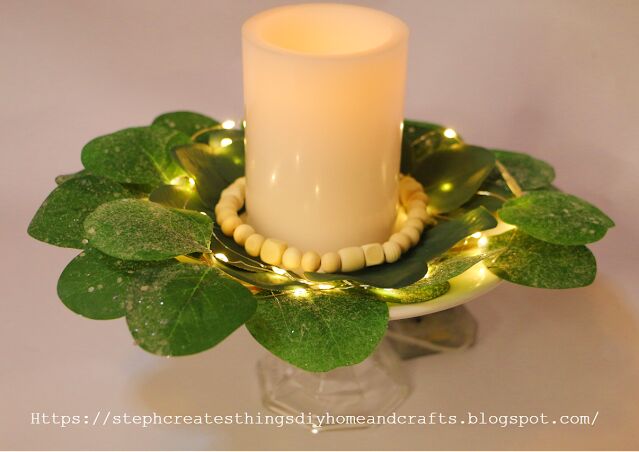 centro de mesa de hojas con mini luces