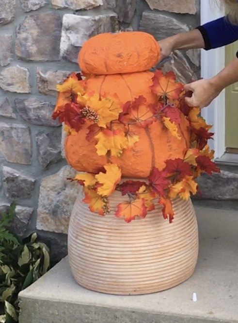 s 12 ways to turn household items into gorgeous fall pumpkin decor, A beautiful trash bag pumpkin topiary