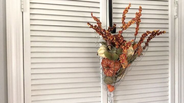 s 12 ways to turn household items into gorgeous fall pumpkin decor, Her festive chicken wire cornucopia