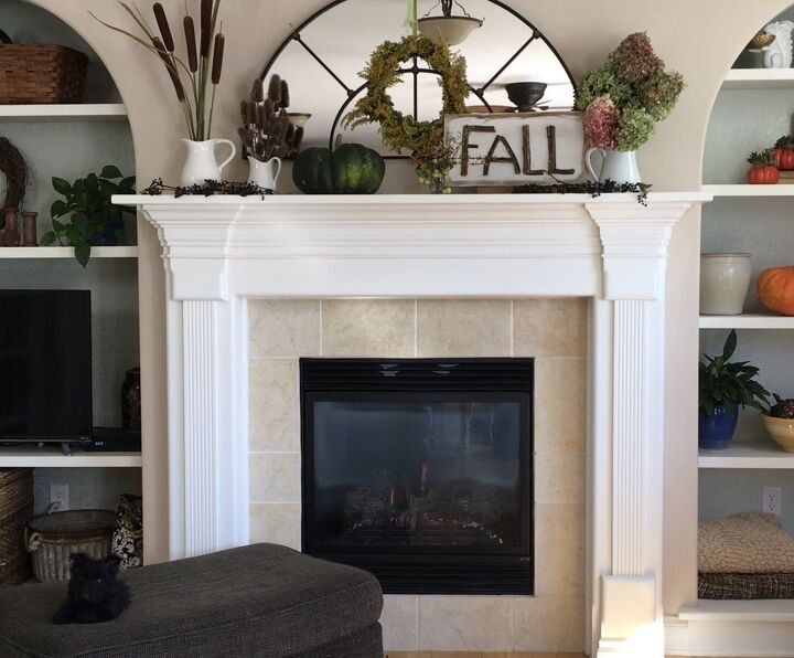 s 13 diy designer ideas you have to try this fall, Her freshly decorated mantel