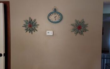 How do  decorate a wall with thermostat in the middle?