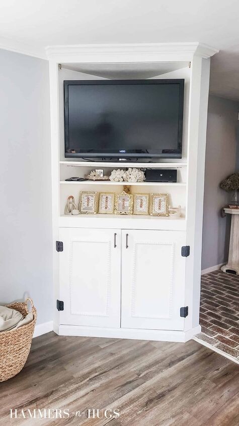 hide the tv cabinet with this budget friendly diy