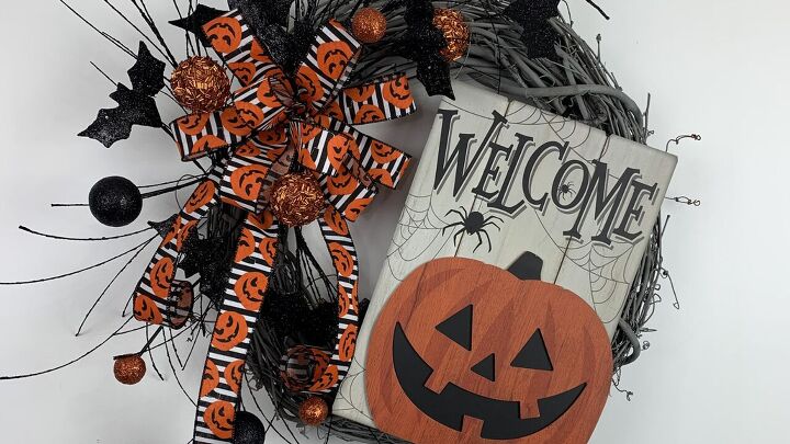 s grab a trash bag and googly eyes for these creepy halloween ideas, His festive Halloween wreath
