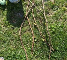 Collect a few sticks to make your porch pumpkin display a million times cooler (for free!)