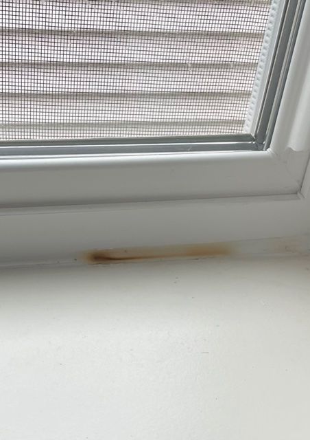 q new windows installed caulk is discoloring in spots