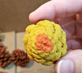 Paint the base of a pine cone for this beautiful tabletop hack